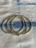 Stack of Alternating Mixed Metal Bracelets