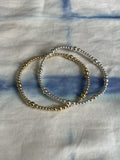 Stack of Alternating Mixed Metal Bracelets